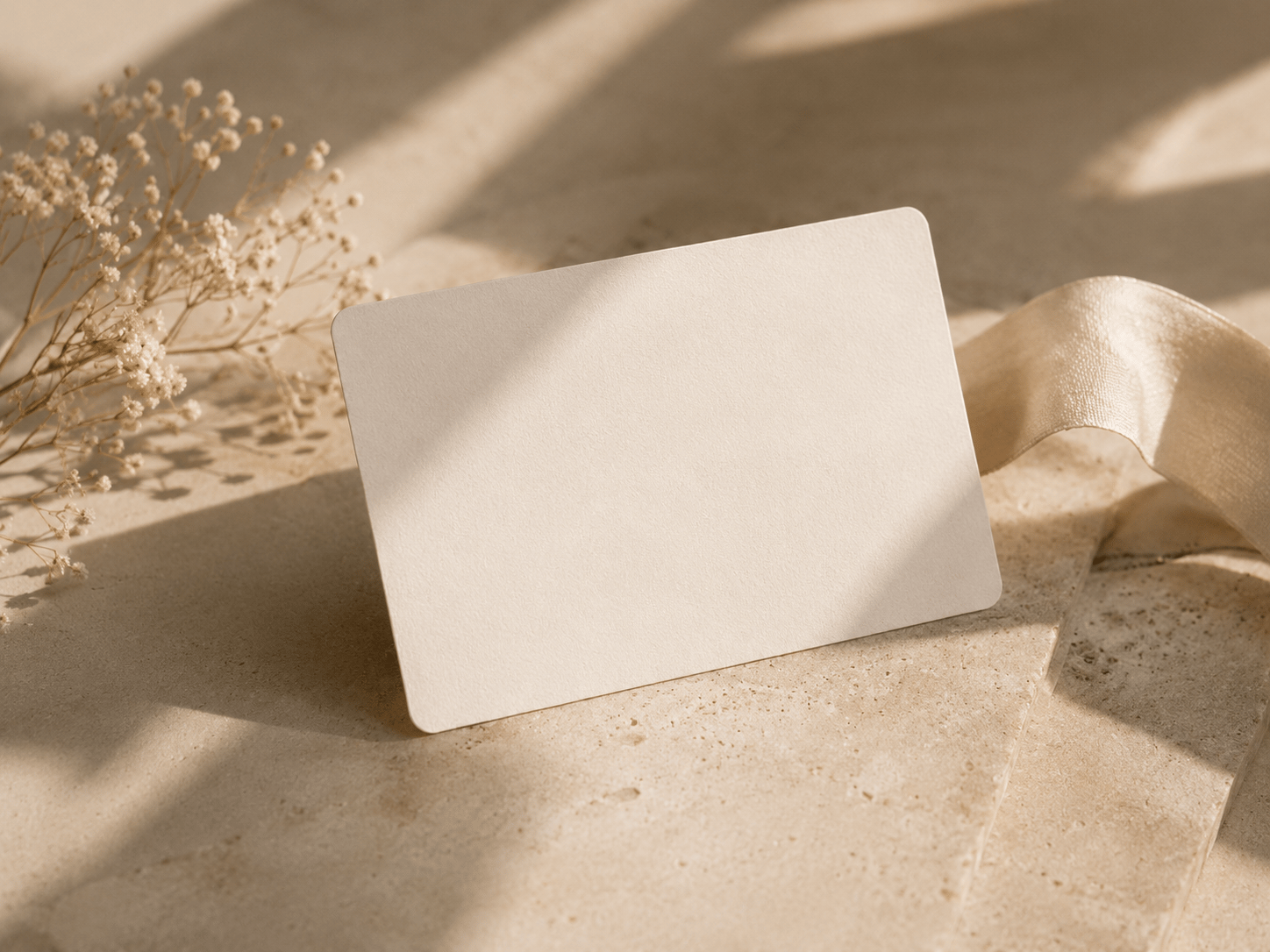 A Rejuv gift card resting on a simple, uncluttered surface.