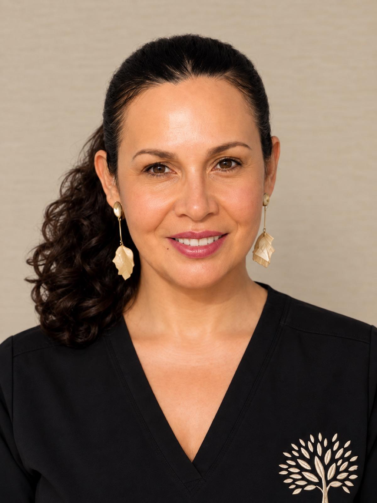 Portrait of Blasi, Licensed Massage Therapist at Rejuv Cosmetic Center & Spa.